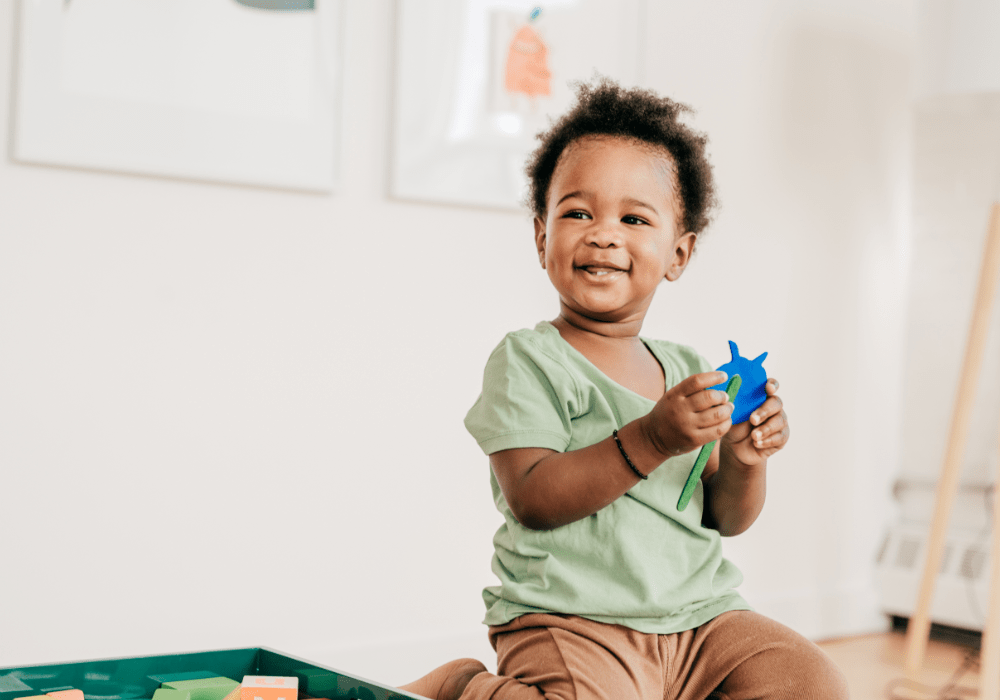 A child of black ethnic majority playing